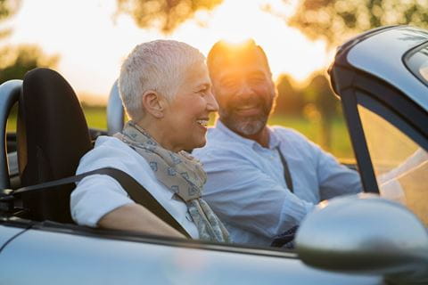 Couple in cabriolet