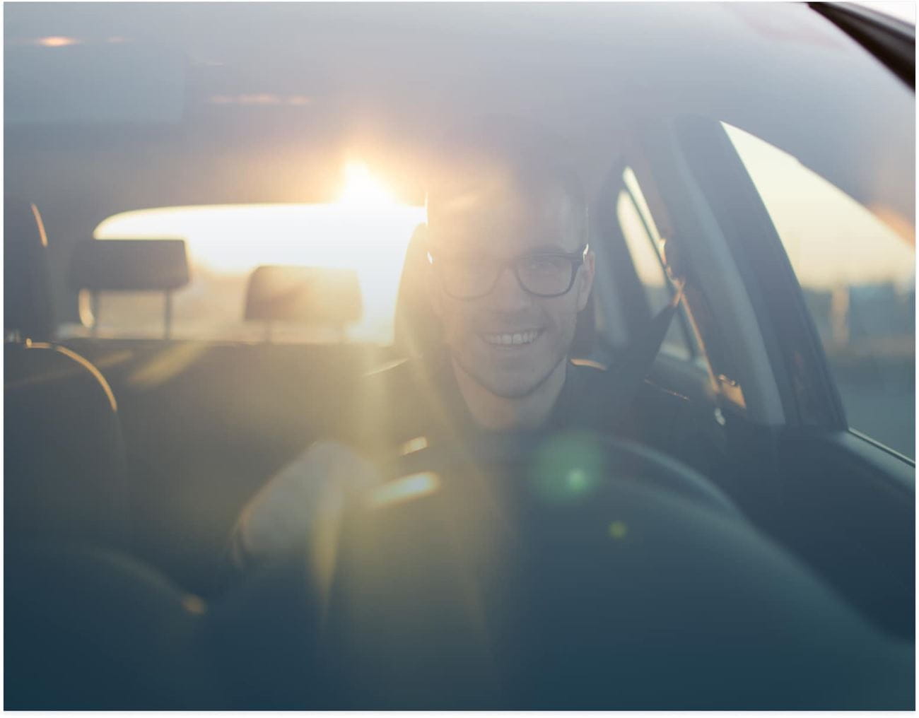 carousel image - happy-man-driving