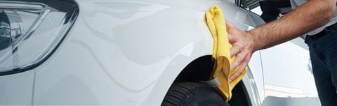 Hero-man-cleaning-car