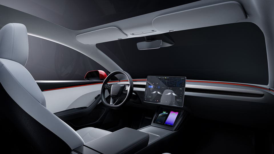 Découvrez le futur de la conduite avec l'Autopilot amélioré de la Tesla Model 3